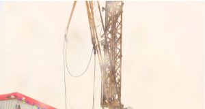 Byggingakrani féll á hús í Urriðaholti um helgina