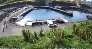 Fá bætur fyrir gröfuna sem fór í höfnina á Borgarfirði